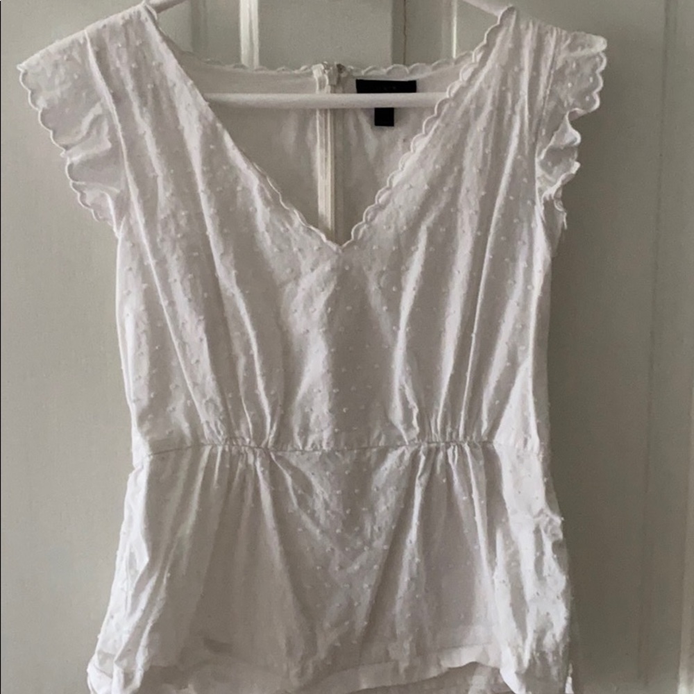 White peplum top